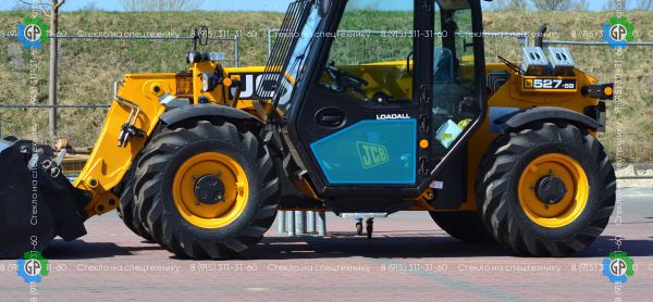 Стекло дверное левое нижнее (закаленное) для JCB Loadall 527-58