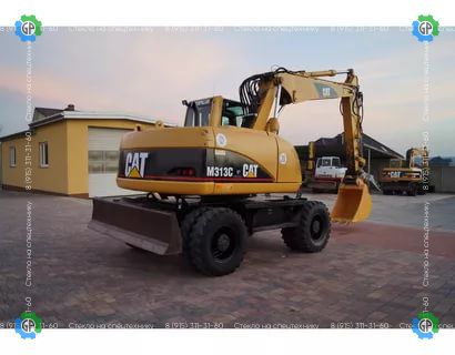Колёсный экскаватор Caterpillar M313C