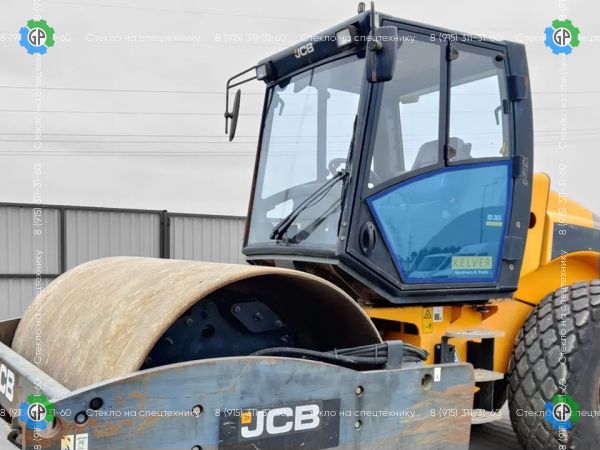Стекло дверное левое нижнее (закаленное) для JCB Vibromax VM115HD