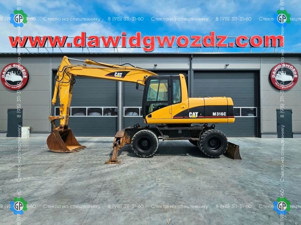 Колёсный экскаватор Caterpillar M319C (2000 год)