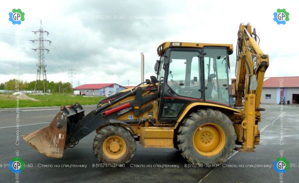 Экскаватор-погрузчик Caterpillar 428D (1997 год)