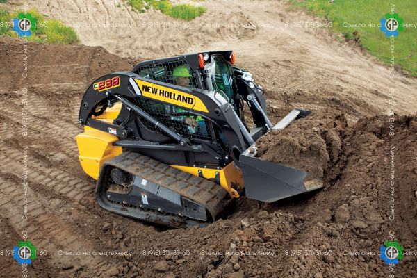 Гусеничный мини-погрузчик New Holland C238 (2009 год)