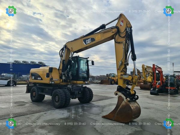 Колёсный экскаватор Caterpillar M318D