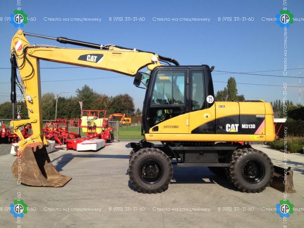 Колёсный экскаватор Caterpillar M313D (2007 год)