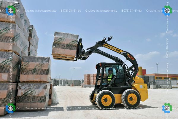 Колёсный мини-погрузчик New Holland L218 (2009 год)