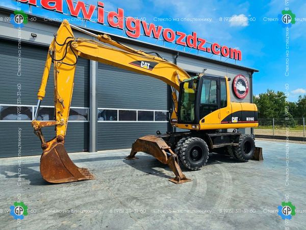 Колёсный экскаватор Caterpillar M318C (2000 год)